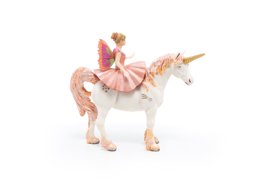 Ballerina on her unicorn figurine