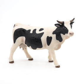 Black and white cow figurine