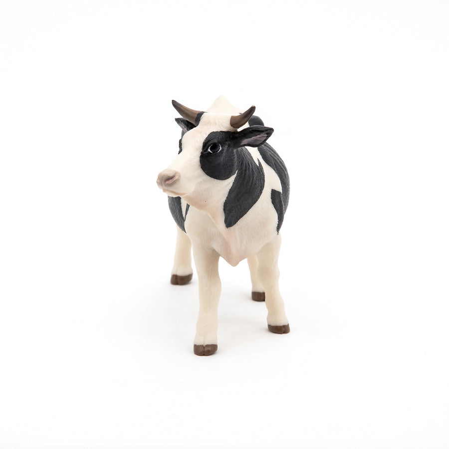 Black and white cow figurine