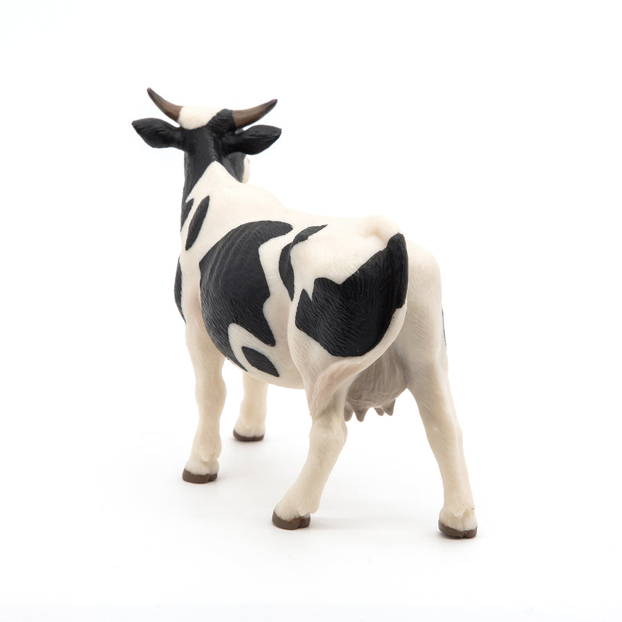 Black and white cow figurine