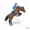 Jumping horse with riding girl