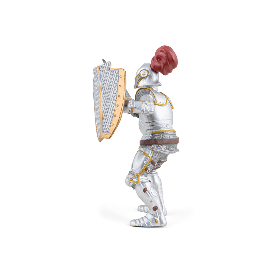 Knight in armor with red plume figurine