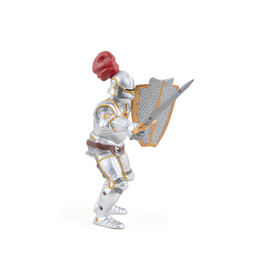 Knight in armor with red plume figurine