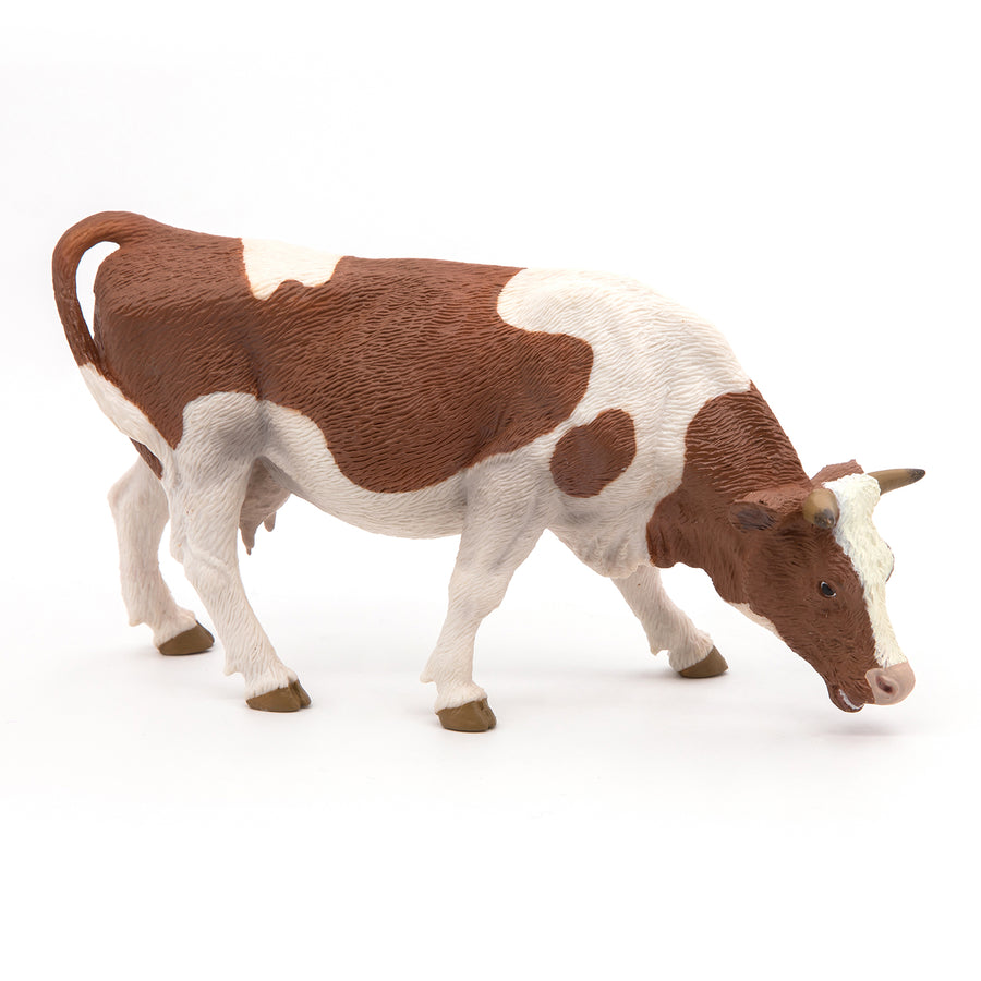 Figurine Vache simmental broutant