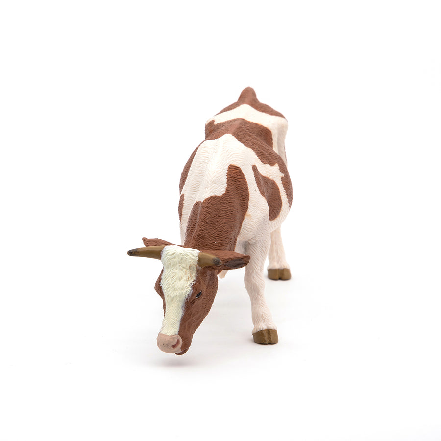 Figurine Vache simmental broutant